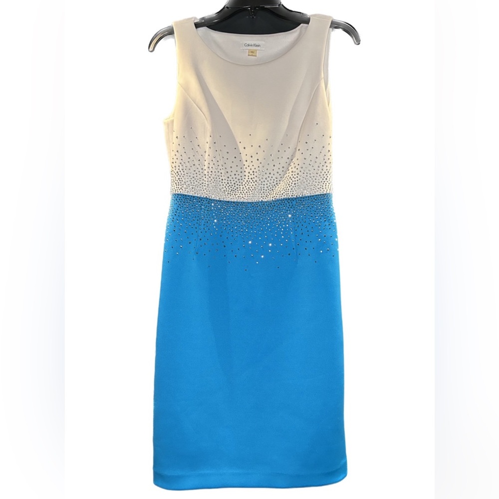 Two tone dress with white on top & turquoise bottom half. Silver rhinestones!